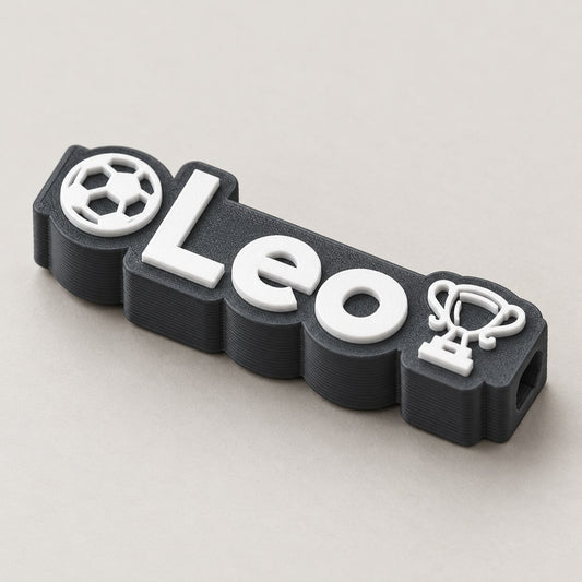 Football Name Pencil Topper: dark 'Leo' football topper alone at a three-quarter angle