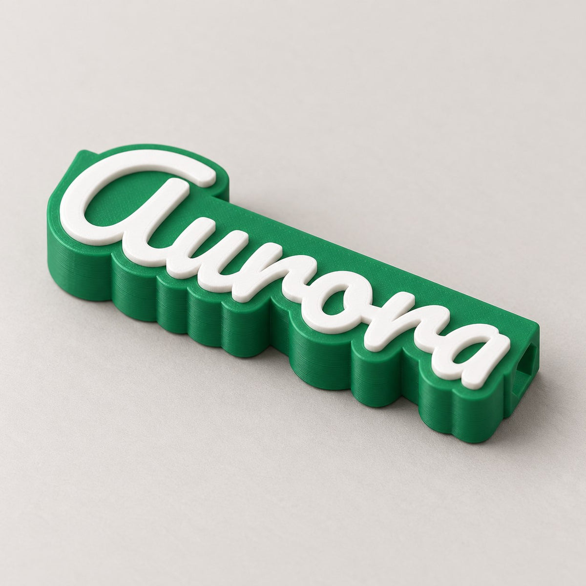 Name Pencil Topper: green 'Aurora' topper alone at a three-quarter angle