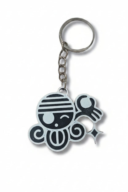 Keychain with a cartoonish design on a white background