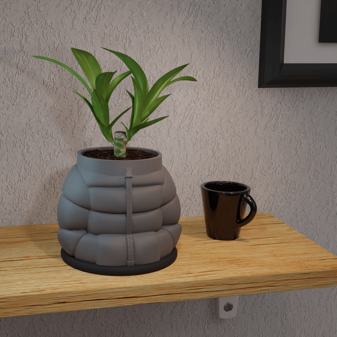 3D printed inflated-jacket planter with a plant, designed by Mold and Matter