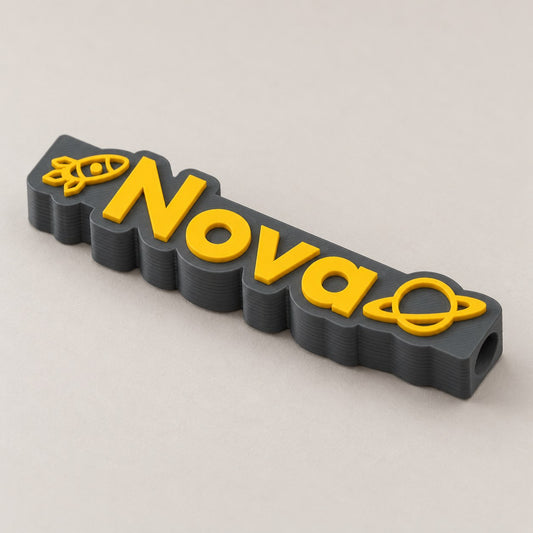 Space Name Pencil Topper: dark grey 'Nova' space topper alone at a three-quarter angle