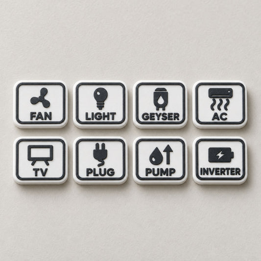 Switch Board Labels: a set of eight white tabs (FAN, LIGHT, GEYSER, AC, TV, PLUG, PUMP, INVERTER) laid out in two neat rows, top-down